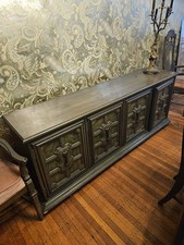 a long, gray sideboard or