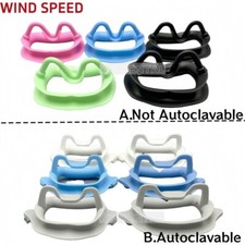 Puntelli retrattore guance