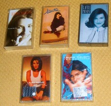 LAURA PAUSINI      5    MUSICASSETTE ORIGINALI