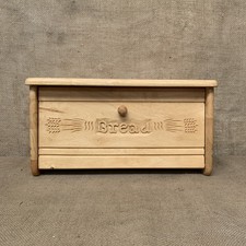 Pattumiera in legno intagliato