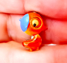 orange chick with blue hat 70s