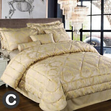 Lussuoso set copripiumone oro