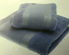 Asciugamano + Ospite