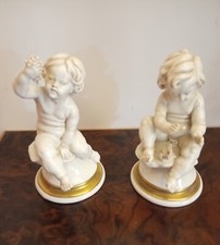 Coppia Statuina Putti