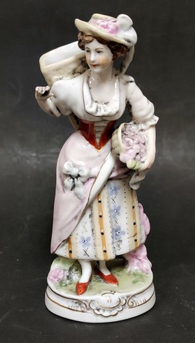 Statua donna con cestino - con,