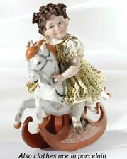 Statua Bambina su cavallino dondolo statuina  in Porcellana Capodimonte 