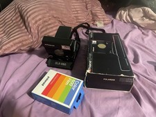 Polaroid SLR-680 completa di scatola con cinturino e manuale (testata e funzionante)