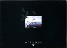 Lancia Prisma Simbolo e brochure colore 1600ie testo inglese 1988
