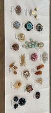 24 pezzi spille + gioielli