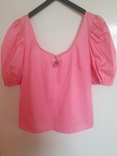 Blusa monocromatica rosa tè