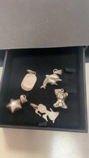 lotto n. 5 ciondoli argento delfini orsetto stellina piastrina angioletto gr. 13