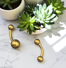 Set da 2 Piercing Banana Acciaio Chirurgico dorato mm. 1,6X10 Pallina mm.5 e  8