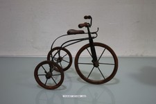 Antica bicicletta in miniatura