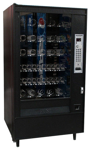 Distributore automatico - , di