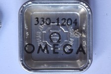Omega 330 mov. part 1204 Arbre de barillet Barrel arbor Albero del bariletto NOS