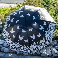 Ombrello con uccellini, cambia