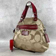 Borsa a tracolla Coach a mano