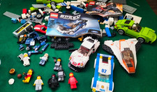 LEGO lotto Personaggi Macchine Navicelle e vari peso 850 gr. Con Rarità