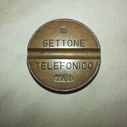 Gettone telefonico 7701 - telefonico, ut