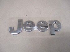 Jeep Grand Cherokee 4 emblema