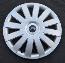 4 enjoliveurs Neuf por/4