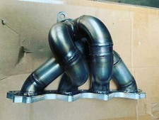 Collettore di scarico tubolare