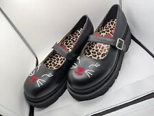 Demonia gatto in pelle nera