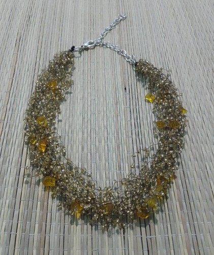 Collana cascata con - semi, di