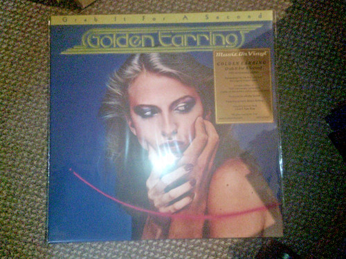Golden earring grab - earring,