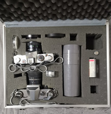 Praktica NOVA & Petri fotocamera reflex TTL con obiettivo e accessori in valigetta