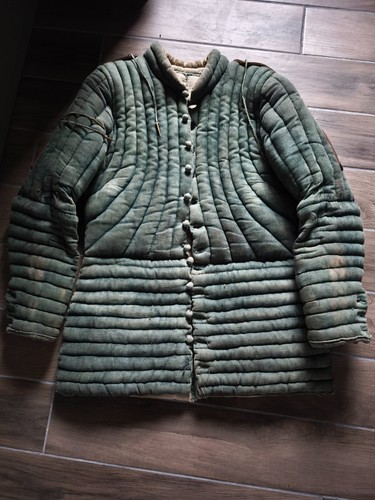 Gambesone verde per