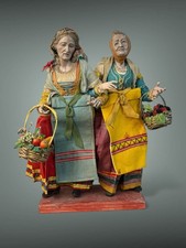 Coppia figure cummar e