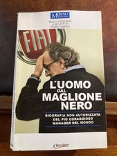 L'UOMO DAL MAGLIONE NERO di