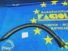 MODANATURA UNO FIAT ARCO RUOTA PARAFANGO POSTERIORE Sx.PLASTICA  FIAT UNO TURBO