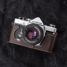 Custodia mezza fotocamera in