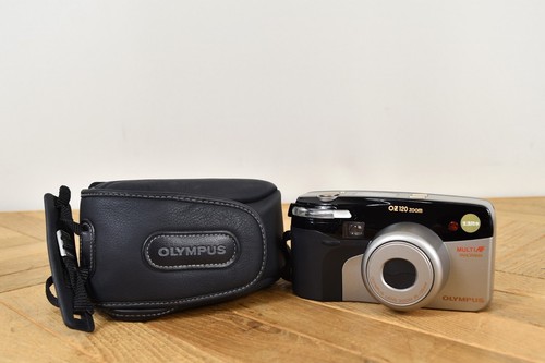 Olympus 120 zoom mm - oz, 35