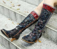 Scarpe stivali al ginocchio