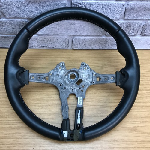 Volante pelle nero - in,