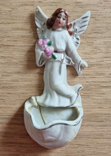 Antica statuetta acquasantiera