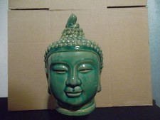 Buddha head on stand
