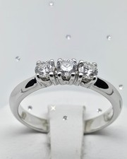 ANELLO TRILOGY ORO BIANCO 18 kt. CON DIAMANTI NATURALI TAGLIO BRILLANTE ct. 0,52