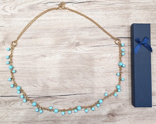 Collana dorata con perle