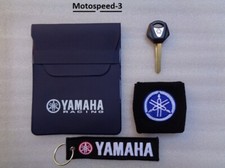 porta documenti yamaha  blu scuro    + portachiavi + chiave + polsino 