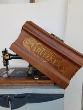 antica macchina da cucire Gritzner  a manovella e coperchio, doppia funzione.