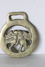 VECCHIO FINIMENTO IN OTTONE PER CAVALLO CON SEGNO ZODIACALE GEMELLI  HORSE BRASS