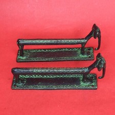 Maniglia per porta a forma di
