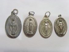 Lotto 4 ciondoli religiosi