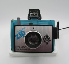 ELECTRIC ZIP POLAROID LAND
