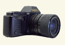 CANON T70 + ZOOM BEROFLEX 35/70. Funzionante. Excellent condition