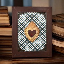 Cornice con cuore sacro